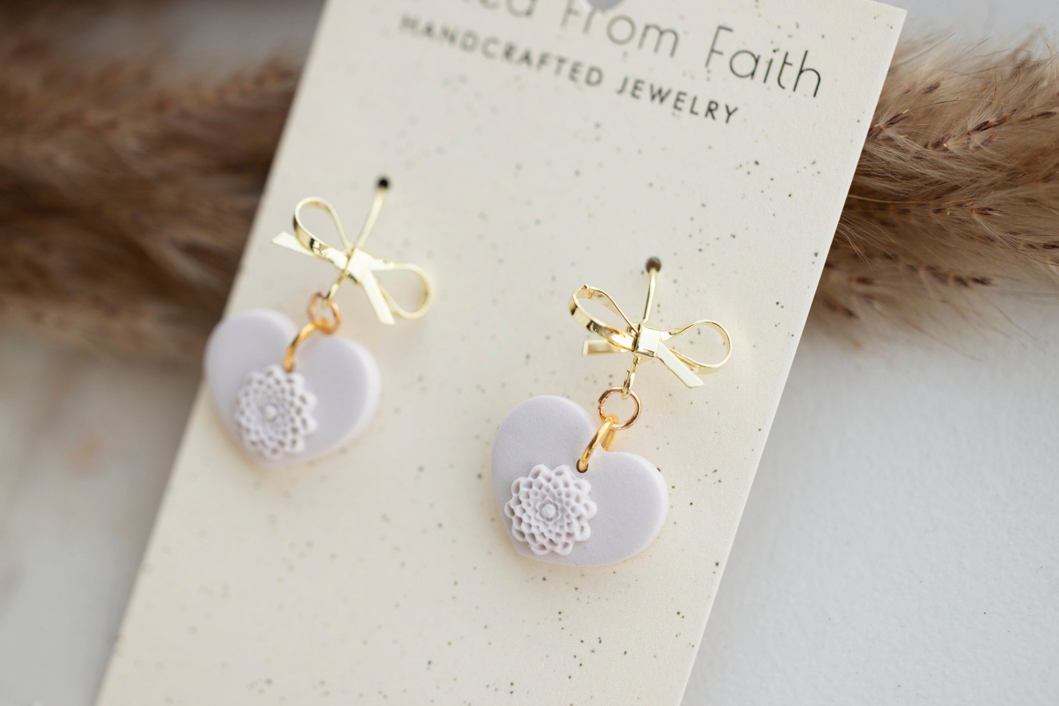 Minimalist Bow Heart Dangles