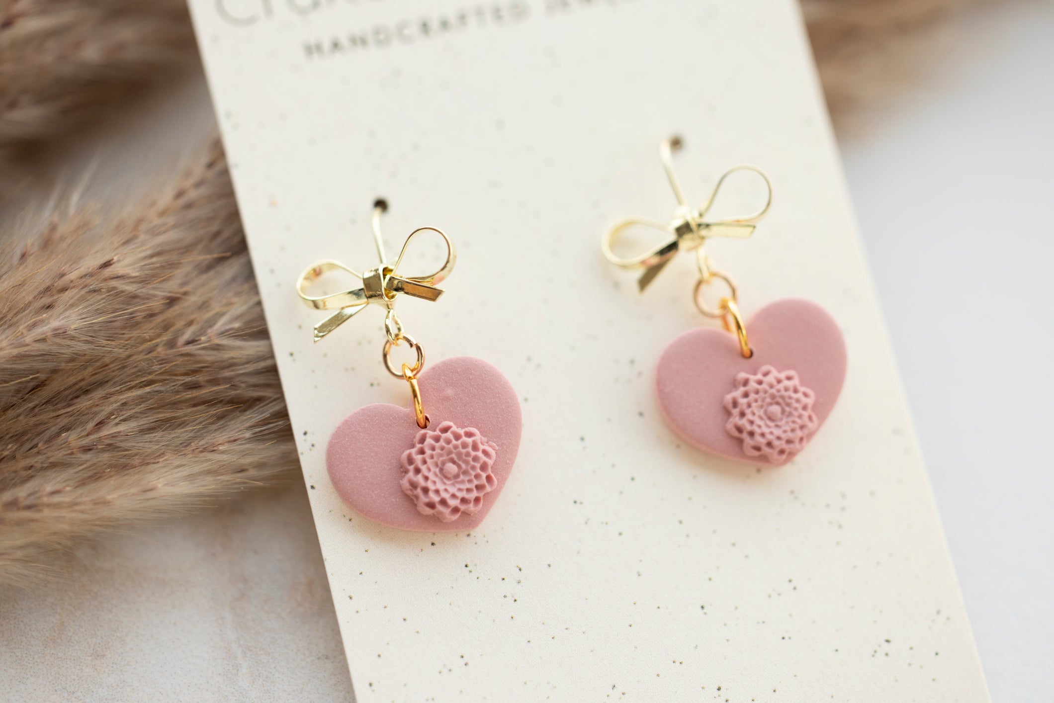 Minimalist Bow Heart Dangles